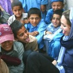 angelina jolie wearing shalwar kameez - salwar kameez with childerns adn tongue out looking cute