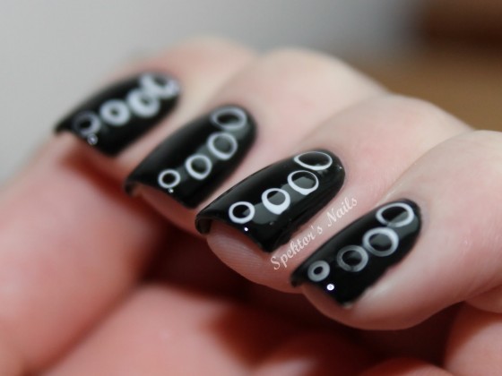 Express your beauty through black nail art