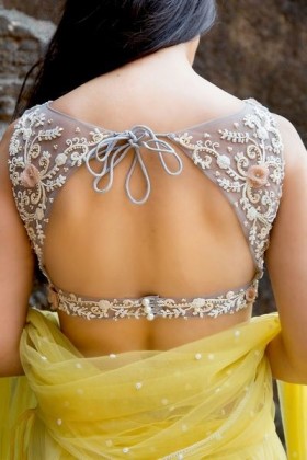 Deep back neck blouse designs for your sari