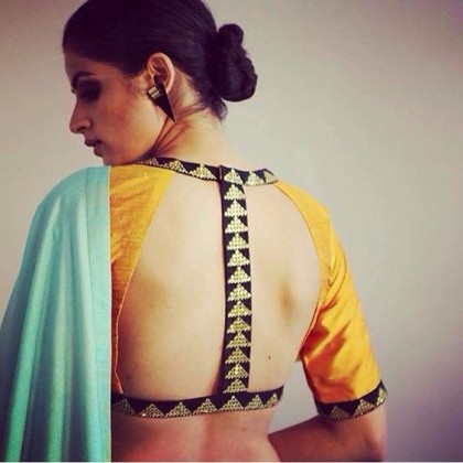Deep back neck blouse designs for your sari